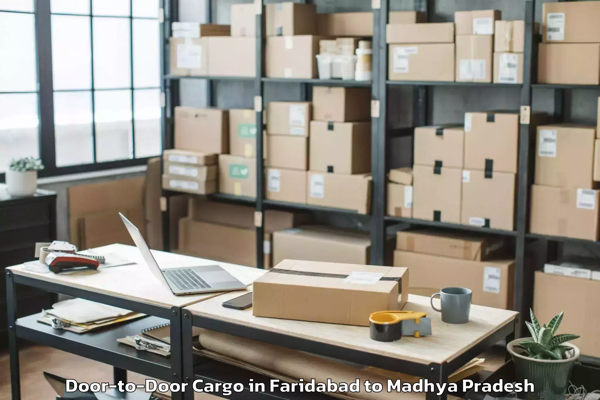 Quality Faridabad to Orchha Door To Door Cargo